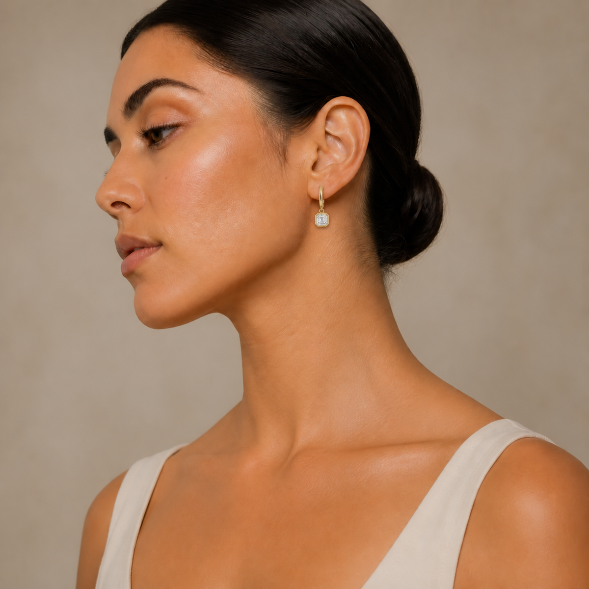 Giselle Asscher Bezel Drop Huggie Hoop Lab-Grown Diamond Earrings in 18K Yellow Gold, worn on ear