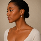 Giselle Emerald Bezel Drop Huggie Hoop Lab-Grown Diamond Earrings in 14K Rose Gold, worn on ear