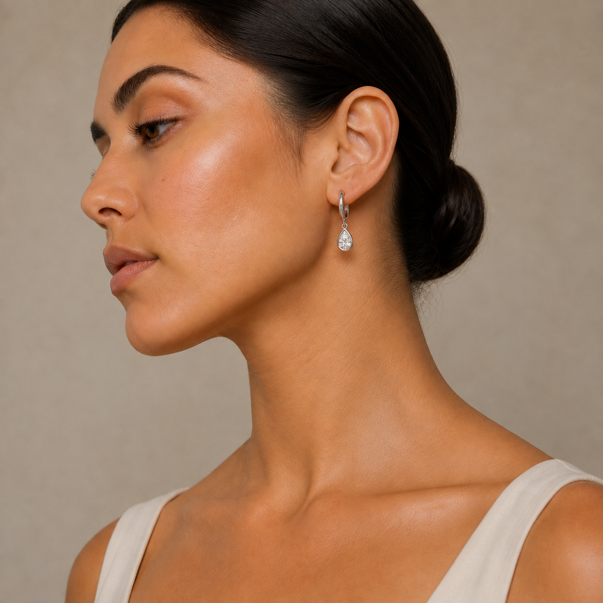 Giselle Pear Bezel Drop Huggie Hoop Lab-Grown Diamond Earrings in Platinum, worn on ear