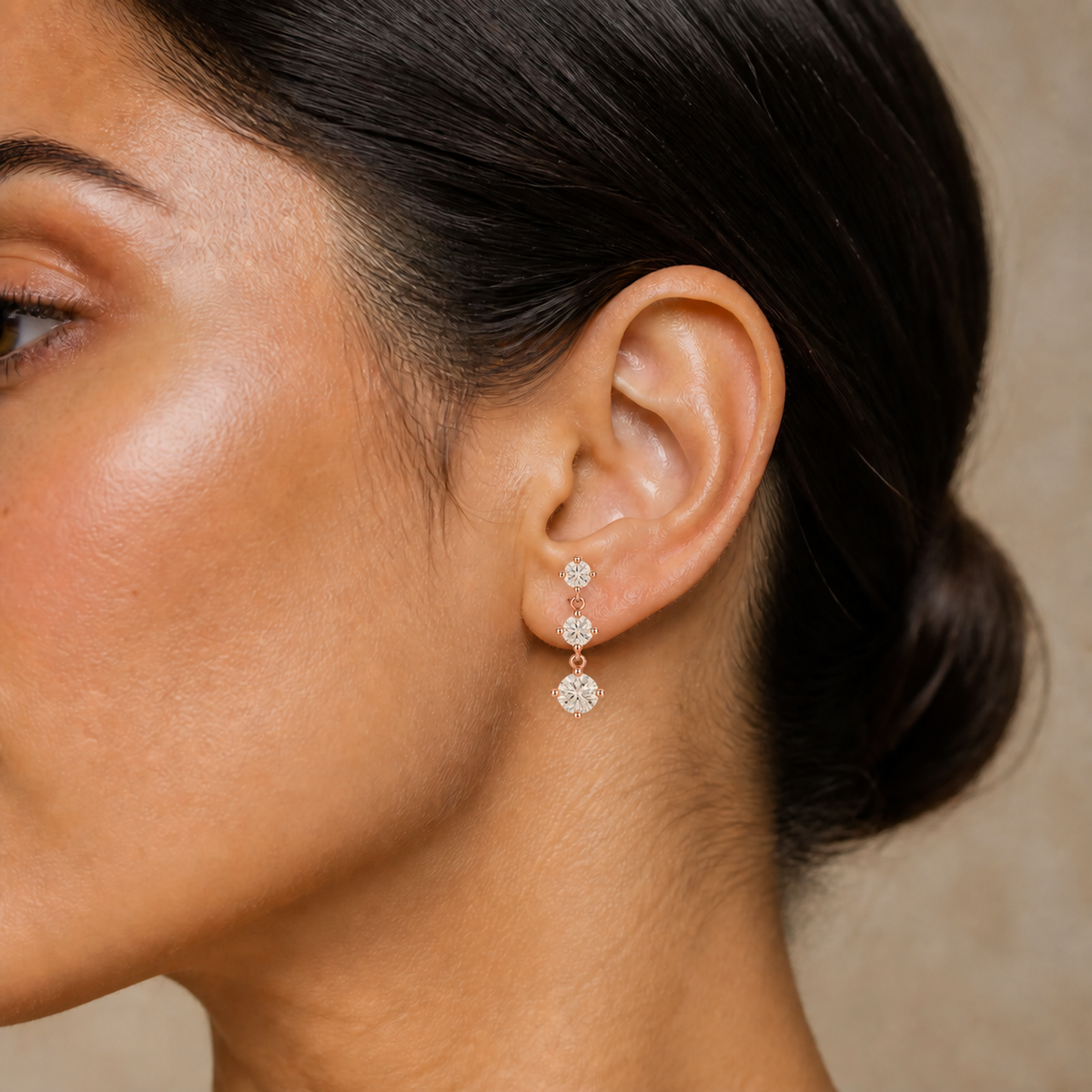 Novella Three Stone Graduated Fancy Drop Lab-Grown Diamond Stud Earrings in 14K Rose Gold, worn on ear