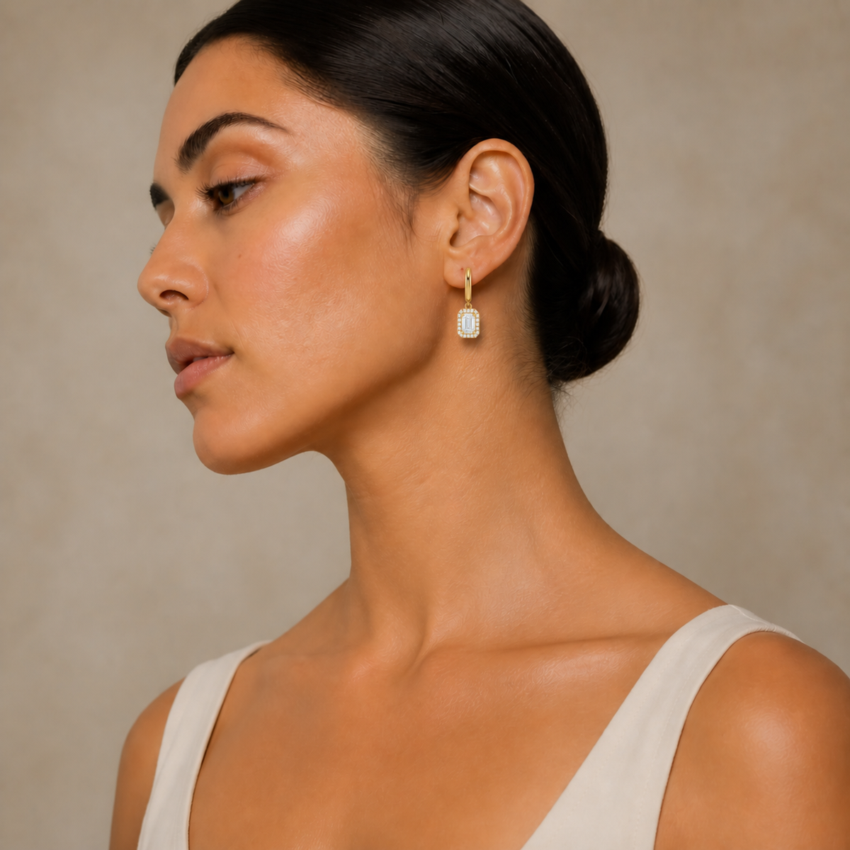 Allegra Emerald Halo Drop Huggie Hoop Lab-Grown Diamond Earrings in 14K Yellow Gold, worn on ear