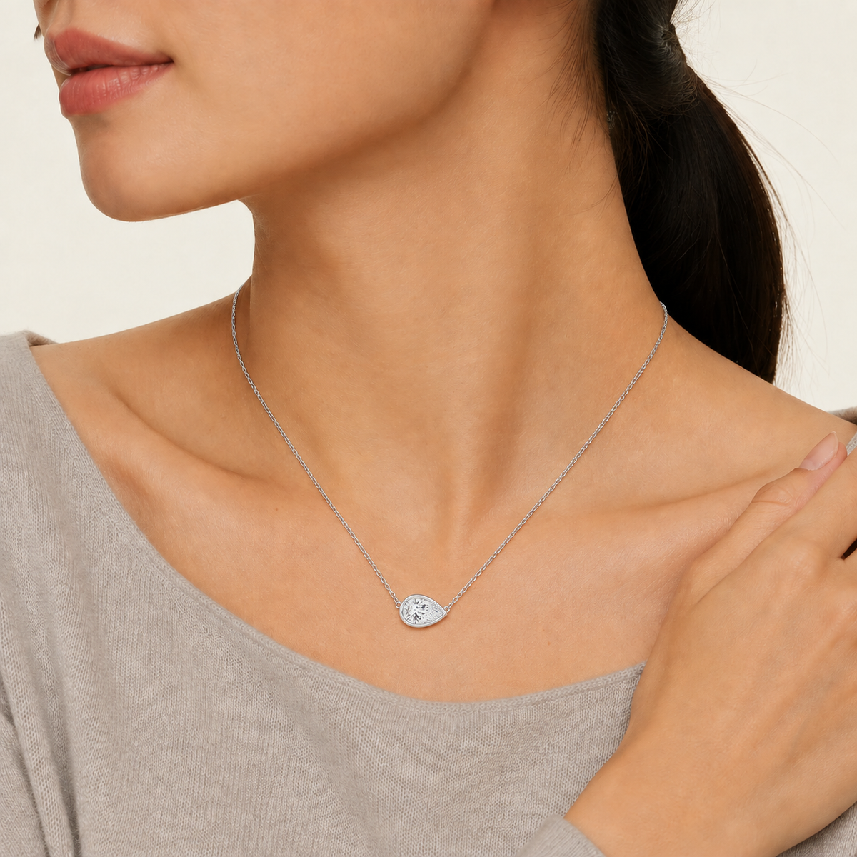 Sienna Pear Bezel Solitaire Lab-Grown Diamond Necklace in 14K White Gold, worn on neck