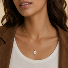 Stellaire Emerald Bezel Solitaire Lab-Grown Diamond Pendant Necklace in 18K Yellow Gold, worn on neck