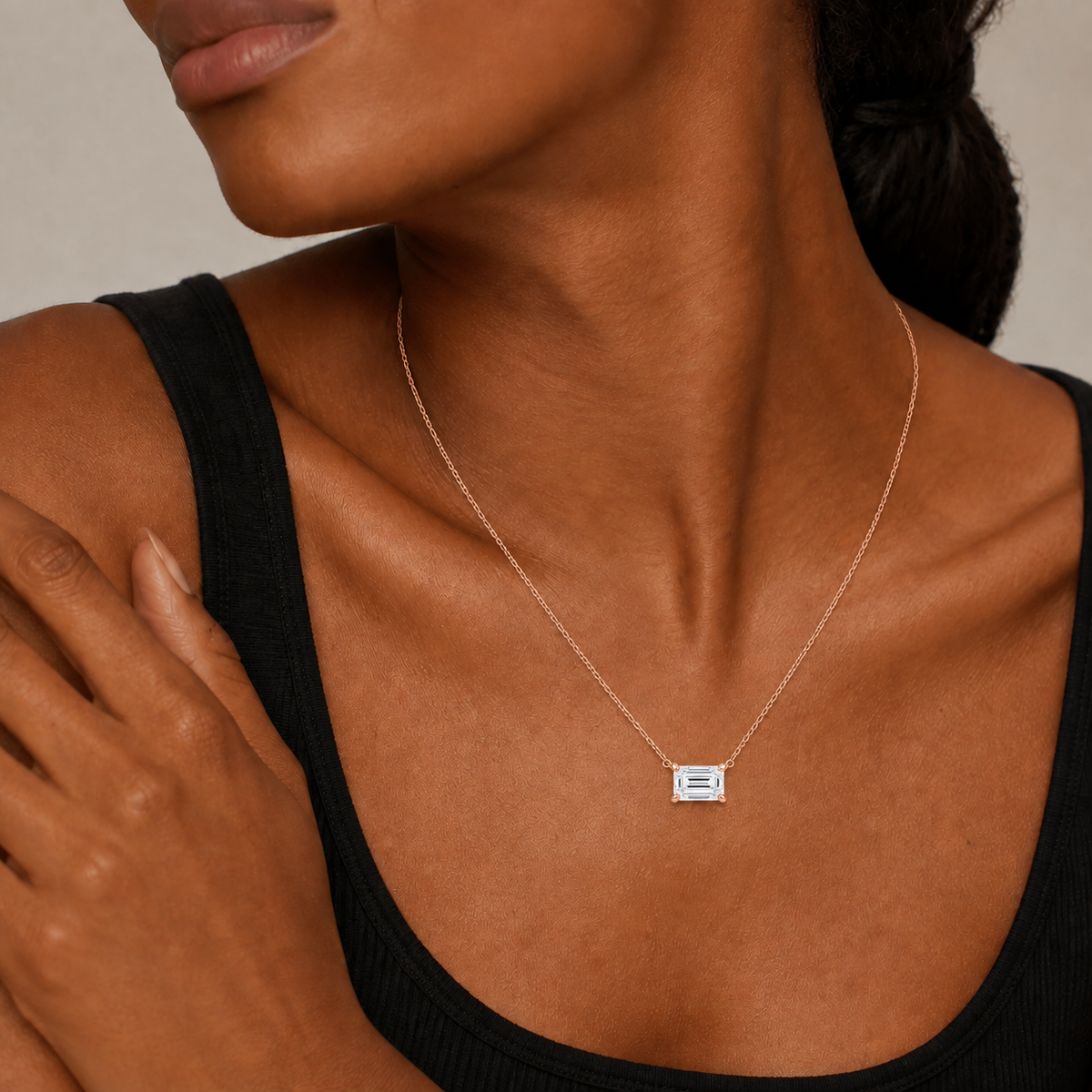 Solenne Emerald Solitaire Lab-Grown Diamond Necklace in 14K Rose Gold, worn on neck