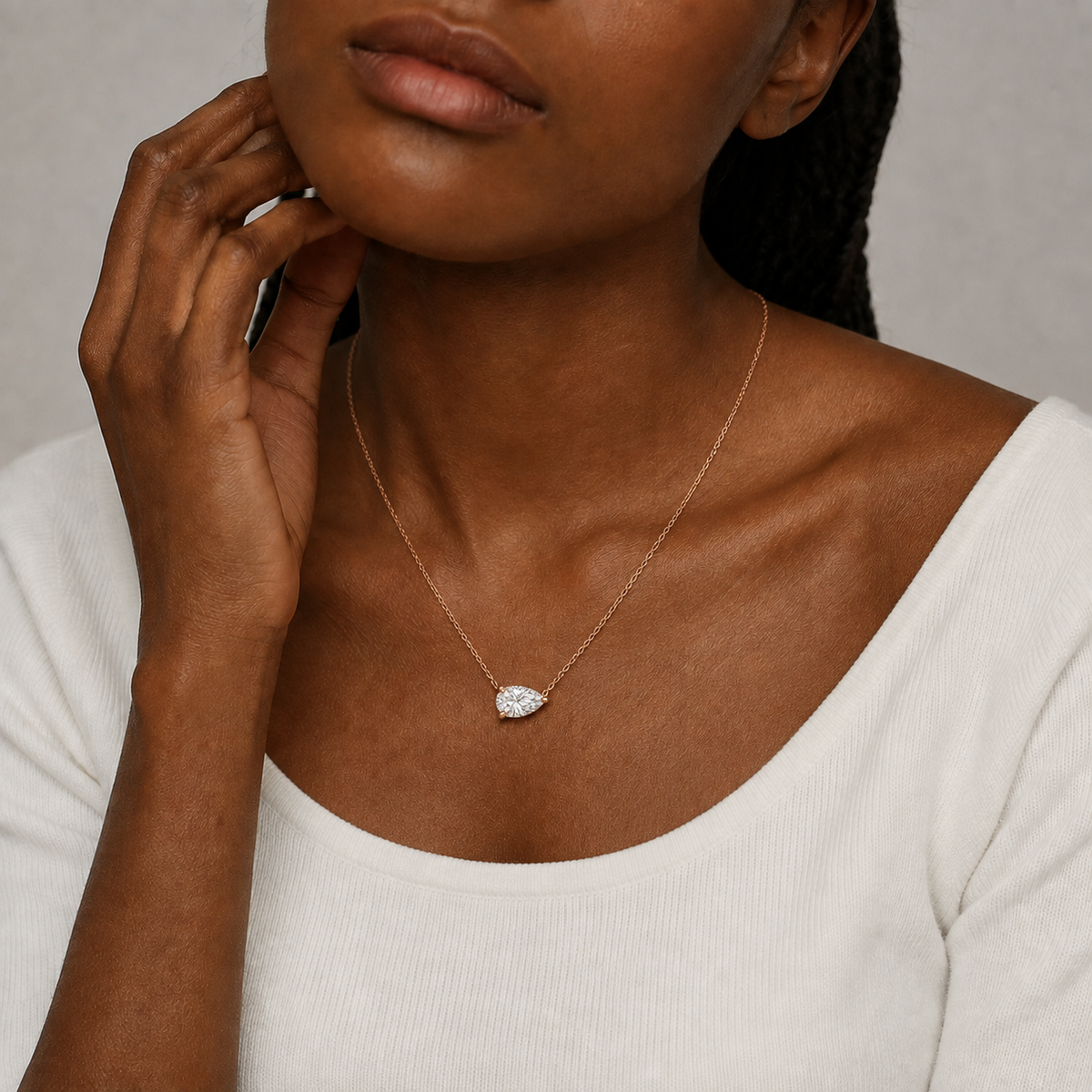 Solenne Pear Solitaire Lab-Grown Diamond Necklace in 14K Rose Gold, worn on neck
