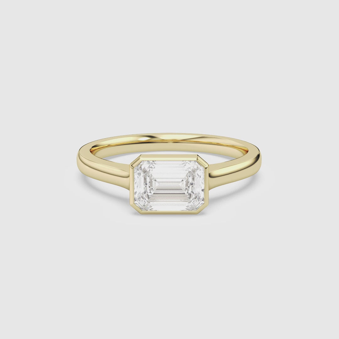 Emerald East-West Bezel Solitaire spin video