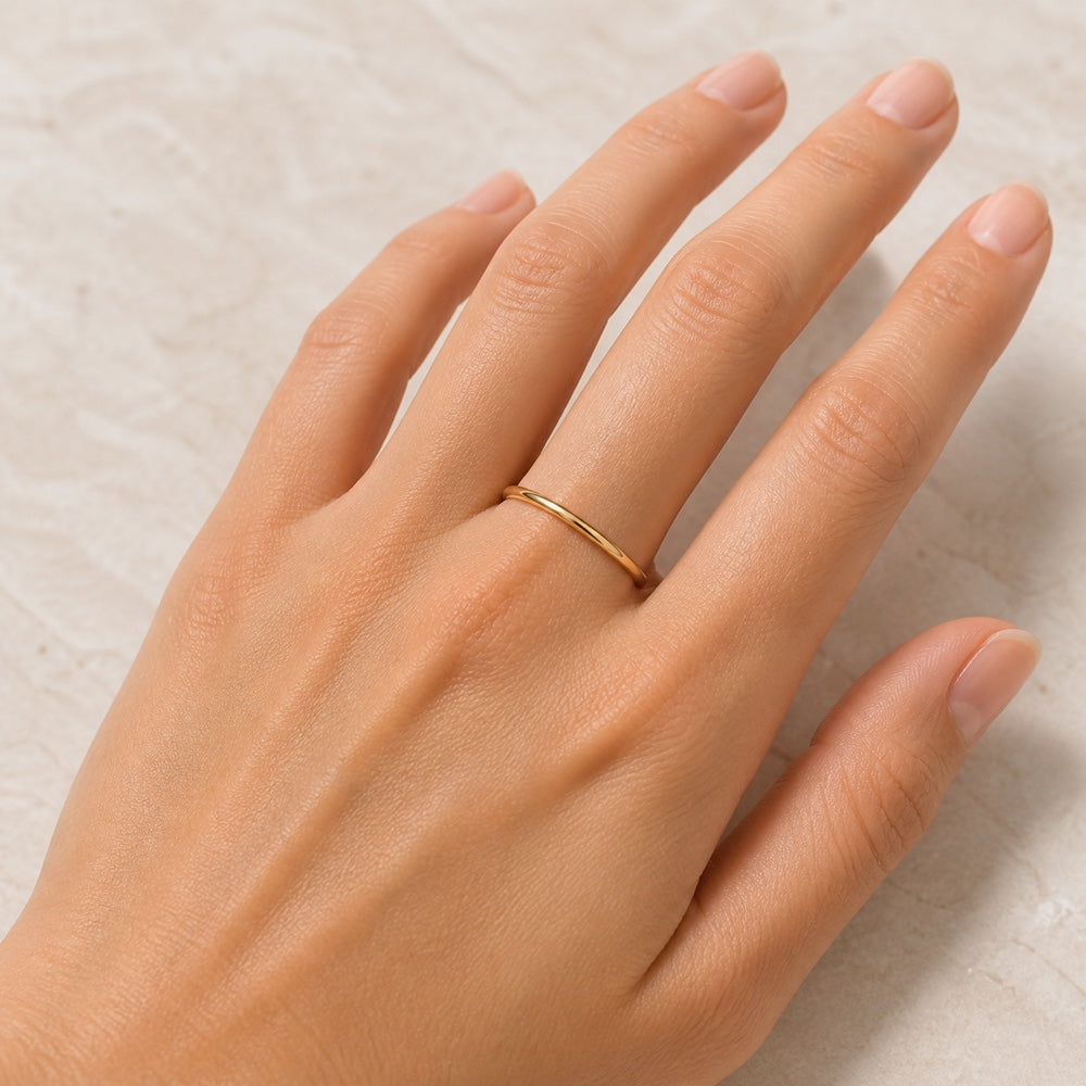 Asscher cut diamond ring shown on hand for scale